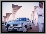 Man in white car in metalic Clio 2